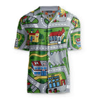 This men's button-up showcases a nostalgic traffic playmat design—a top-down cartoon cityscape with winding gray roads (complete with lane markers and crosswalks) cutting through patches of bright green. Contact us with accessibility feedback, we'd love to help!