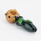 A mini spoon pipe with beehive decorative