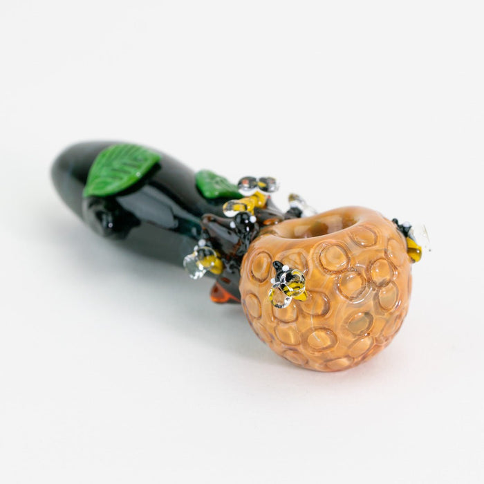 glass pipe with decorative honeycomb and beehive design