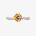 Silver band ring featuring a bright orange enamel sunflower on a white background