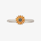 Silver band ring featuring a bright orange enamel sunflower on a white background