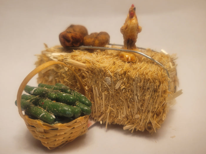 Haybale with Chicken and Cucumbers in Woven Basket