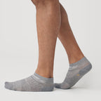 Heather Gray Ankle Socks 12-Pack on feet, showcasing ventilation panels.