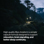 Two hikers with headlamps walking along a forest trail at dusk, illustrating the calming and sleep-supporting benefits of Inositol supplements.