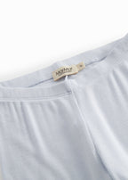 Light blue leggings for children with fine lace details at the bottom.