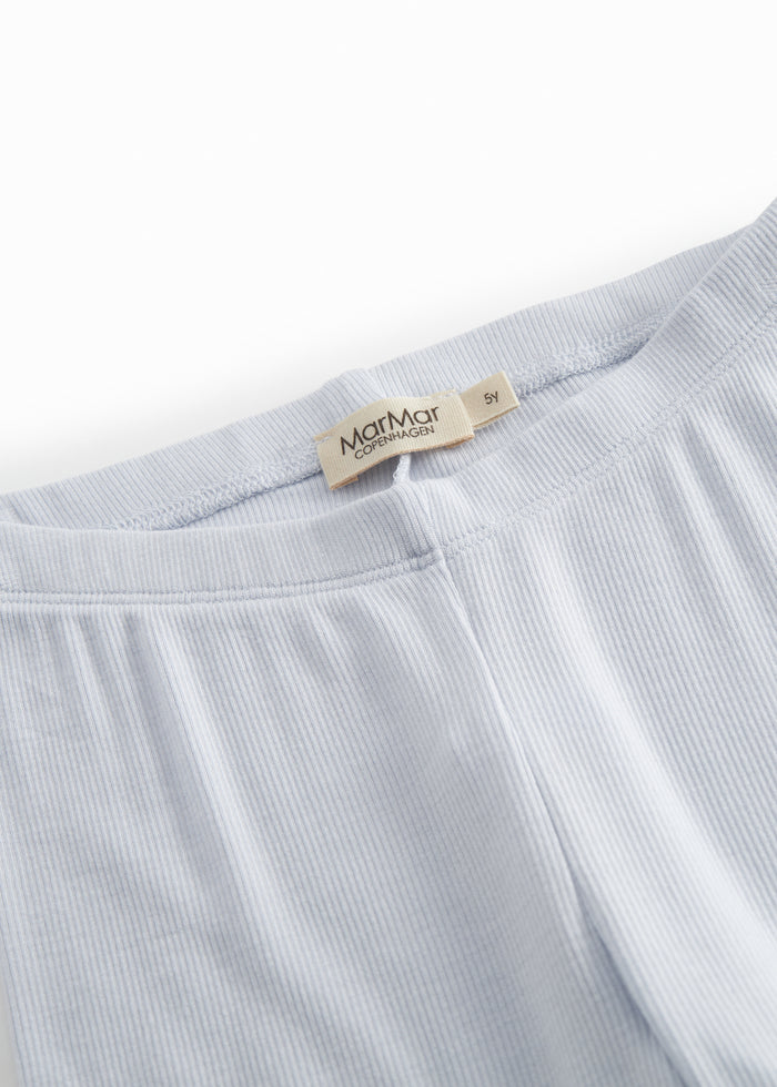 Light blue leggings for children with fine lace details at the bottom.