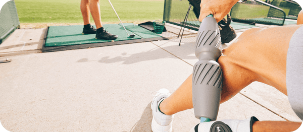 A person using the RAD Muscle Flushing Kit | RAD recovery tool on their calf outdoors, demonstrating its use in muscle care and wellness.