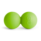 RAD Roller Soft | RAD in bright green color designed as a double ball for targeted muscle recovery and wellness body care.