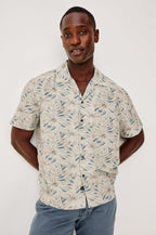 Rhodes Boxy Button-Up Shirt in Crepe With Back Box Pleat, Vintage-Inspired Notched Collar, Front Buttons, and Short Sleeves in Callalily Cream Colorway - Upper Body Front View Featured on Model