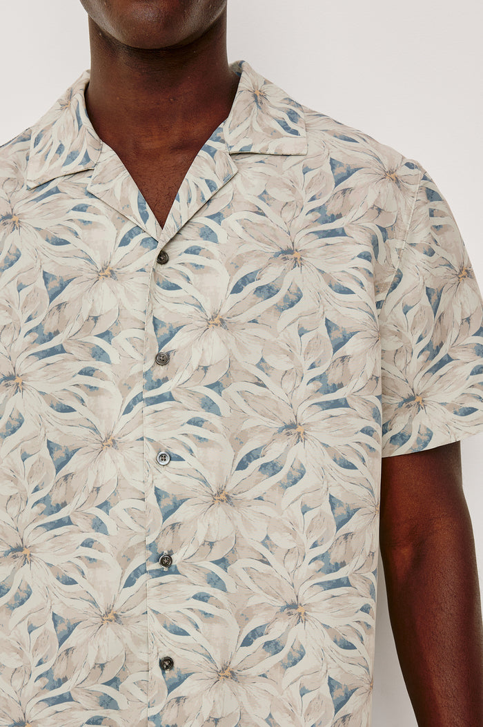 Rhodes Boxy Button-Up Shirt in Crepe With Back Box Pleat, Vintage-Inspired Notched Collar, Front Buttons, and Short Sleeves in Callalily Cream Colorway - Upper Body Front Detail View Featured on Model