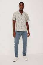 Rhodes Boxy Button-Up Shirt in Crepe With Back Box Pleat, Vintage-Inspired Notched Collar, Front Buttons, and Short Sleeves in Callalily Cream Colorway - Full Body Front View Featured on Model