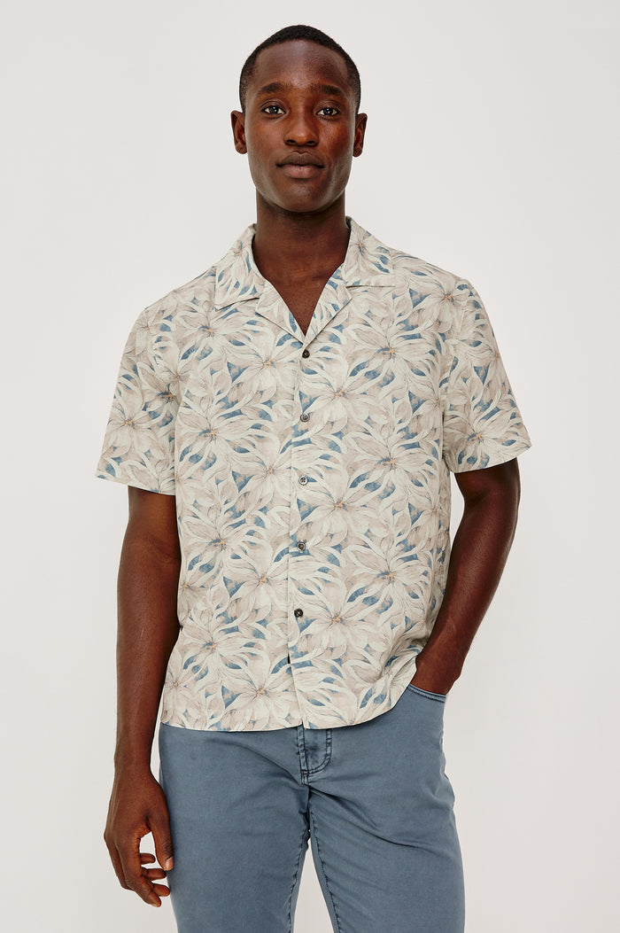 Rhodes Boxy Button-Up Shirt in Crepe With Back Box Pleat, Vintage-Inspired Notched Collar, Front Buttons, and Short Sleeves in Callalily Cream Colorway - Upper Body Front View Featured on Model