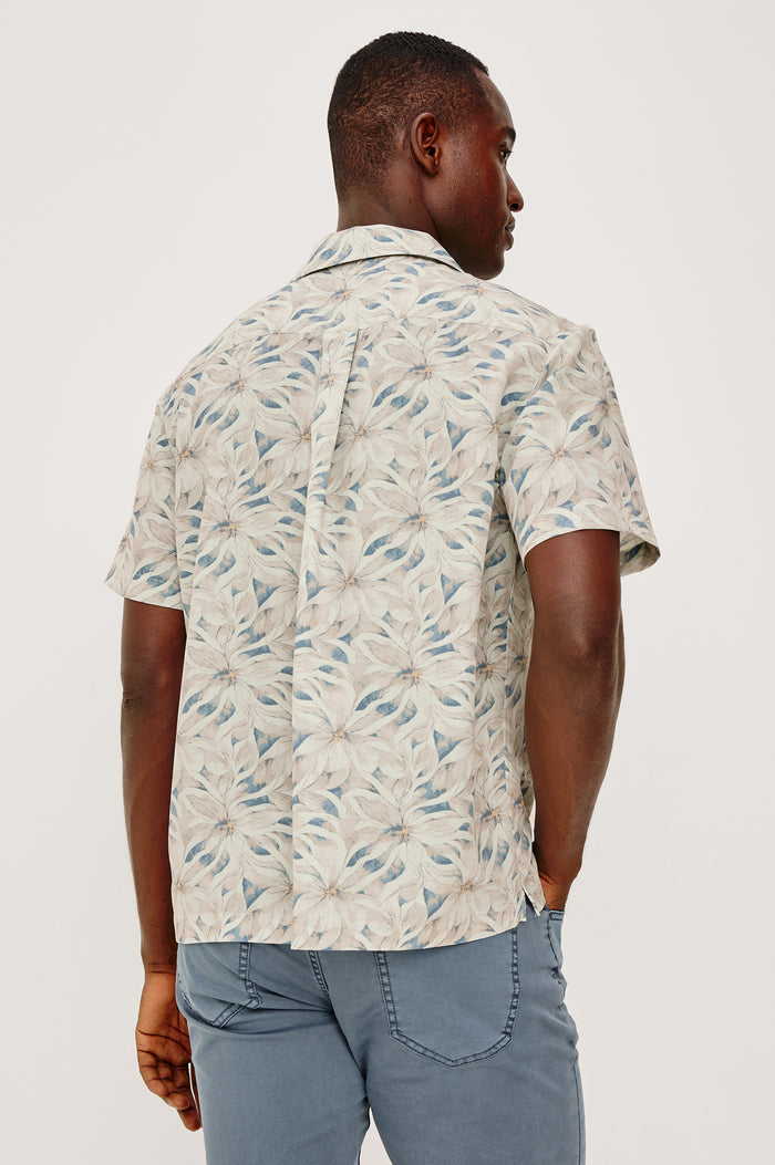 Rhodes Boxy Button-Up Shirt in Crepe With Back Box Pleat, Vintage-Inspired Notched Collar, Front Buttons, and Short Sleeves in Callalily Cream Colorway - Upper Body Back View Featured on Model