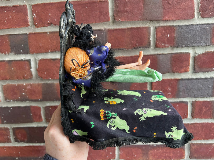Sculpted Witch Doll on Floating Blanket Bed Halloween