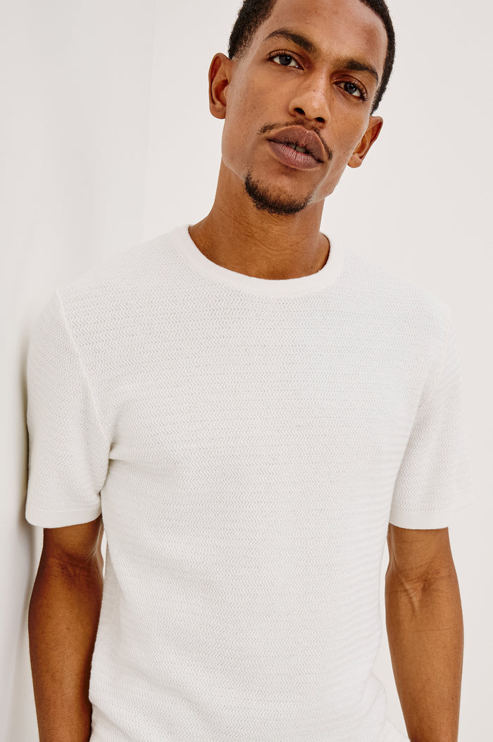 Theo T-Shirt in Ribbed Cotton-Cashmere With Crew Neckline, Short Sleeves, and Classic Fit in Porcelain Colorway - Upper Body Front View Featured on Model