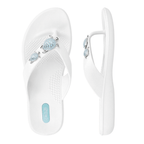 White flip-flop sandals with blue and silver turtle embellishments on the straps, featuring textured footbeds for comfort, named Theresa | Oka-B.
