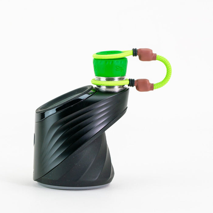 Green tether attachment on Puffco device