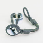 Black and white tuff tether attachment laying on white background
