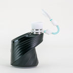 White Puffco attachment on white background with opened lid